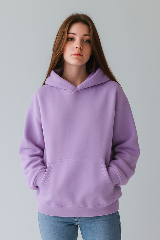 Person wearing a purple hoodie against a plain background