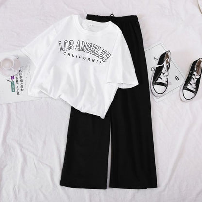 BLACK FLAPPER - WHITE CROP TEE LOSS ANGELES